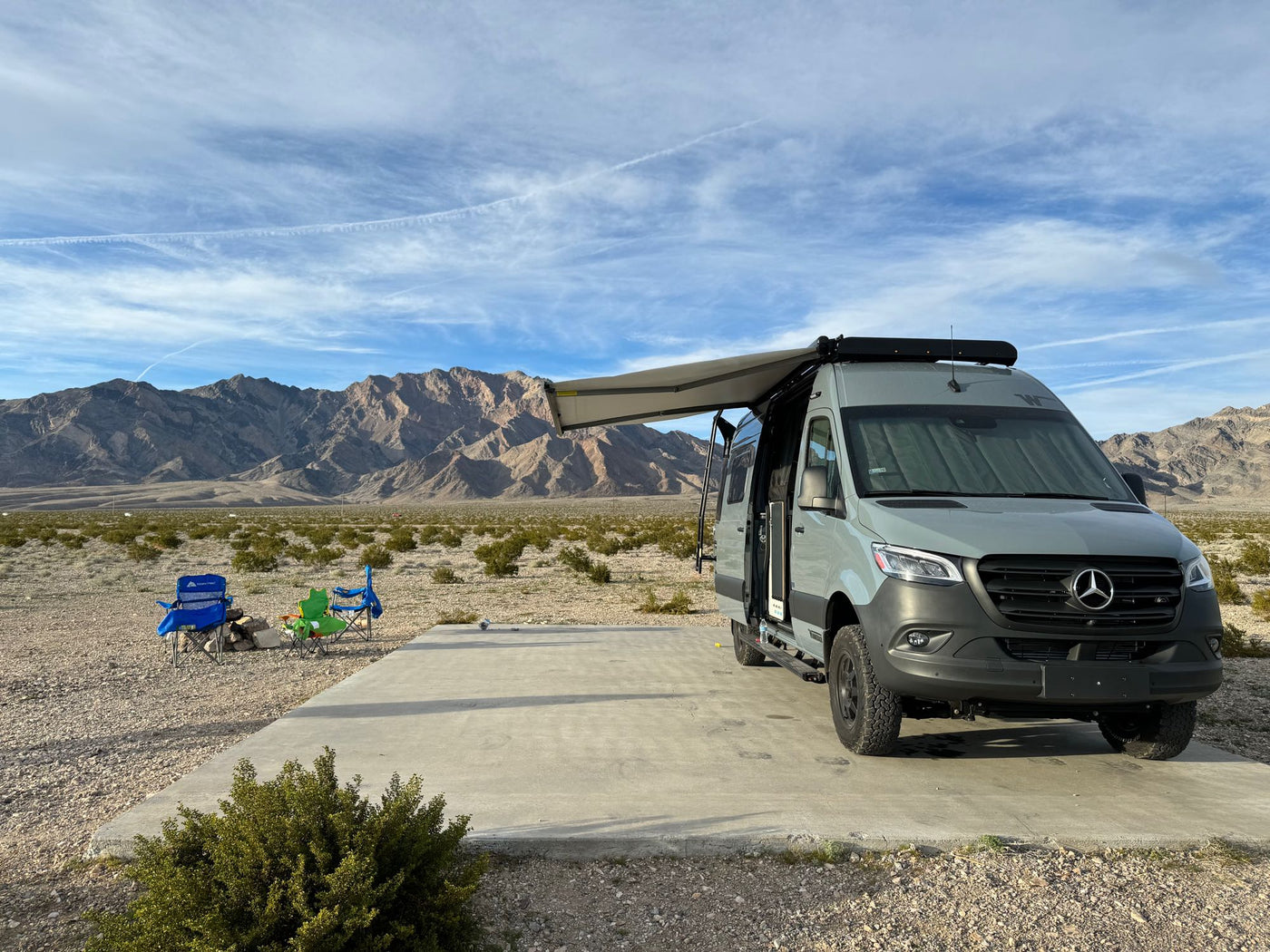  ready for adventure.|Experience adventure: a sleek grey Mercedes-Benz|Your RV rental adventure awaits! Grey camper van with open doors — photo 5