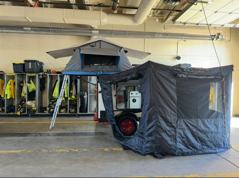  featuring a rooftop tent and gear storage — photo 2