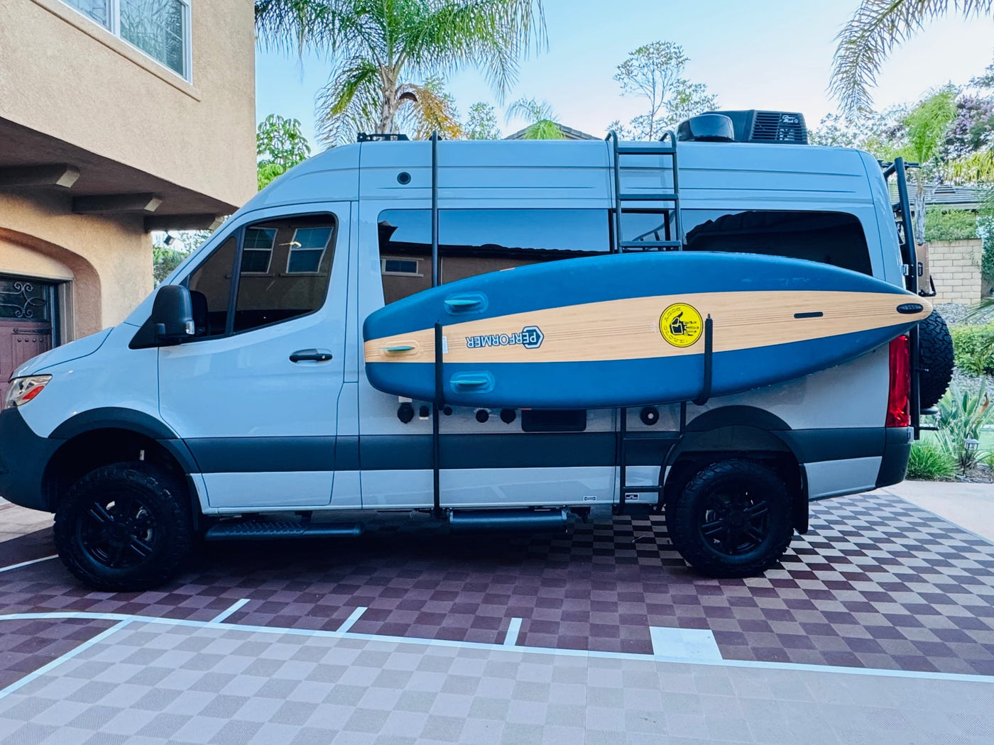  parked under an awning with bikes on the back — photo 4