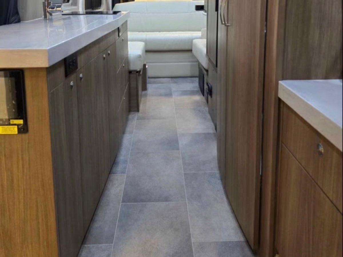  and trash bin. Wood interior walls.|RV rental: Modern camper van interior with kitchen (sink — photo 13