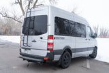 Silver Mercedes Sprinter Geotrek camper van, perfect for your next rv rental adventure. Features rear ladder & tinted windows.