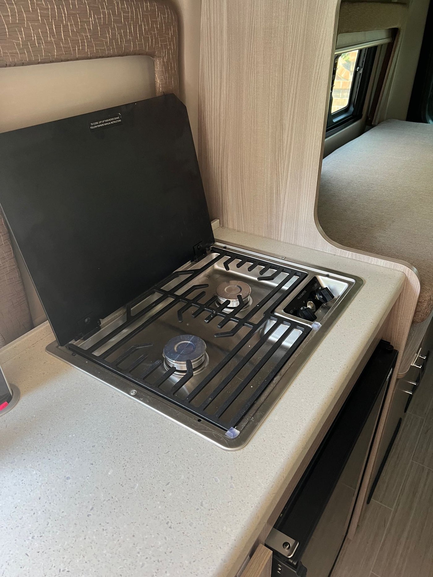  and a unique basketball backboard attachment.|Interior of a clean rv rental van