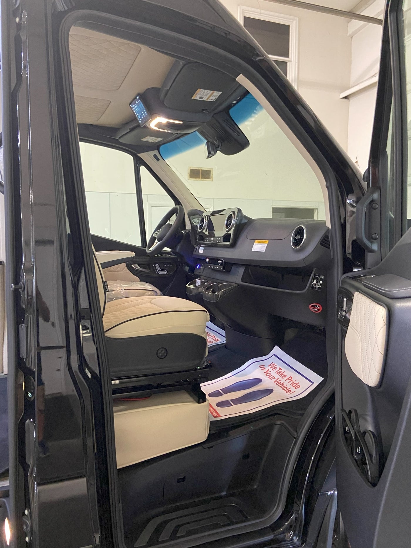  and modern amenities for comfortable travel.|Black Mercedes Sprinter van — photo 10