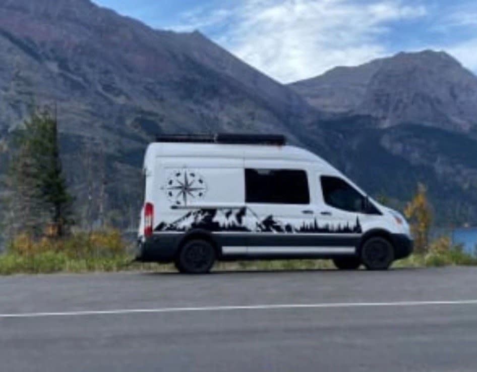  ideal for rv rental. White with mountain/compass decals — photo 2