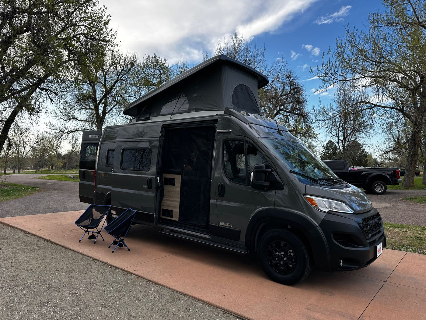  with its pop-top extended and side door open — photo 8