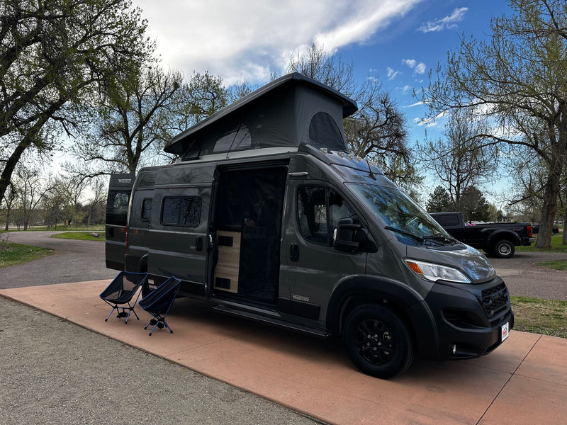  with its pop-top extended and side door open — photo 8