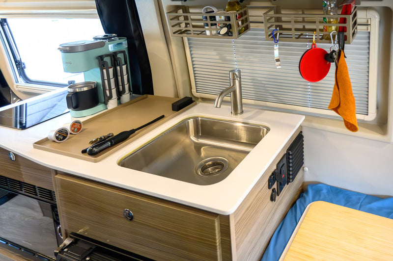  featuring a window and slatted floor.|Inside this rv rental — photo 9