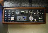 RV rental control panel: lights, battery, water levels, heater, and poptop. Essential for campervan comfort.