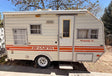 This cream-colored vintage Shasta travel trailer