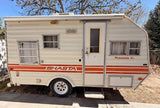 This cream-colored vintage Shasta travel trailer