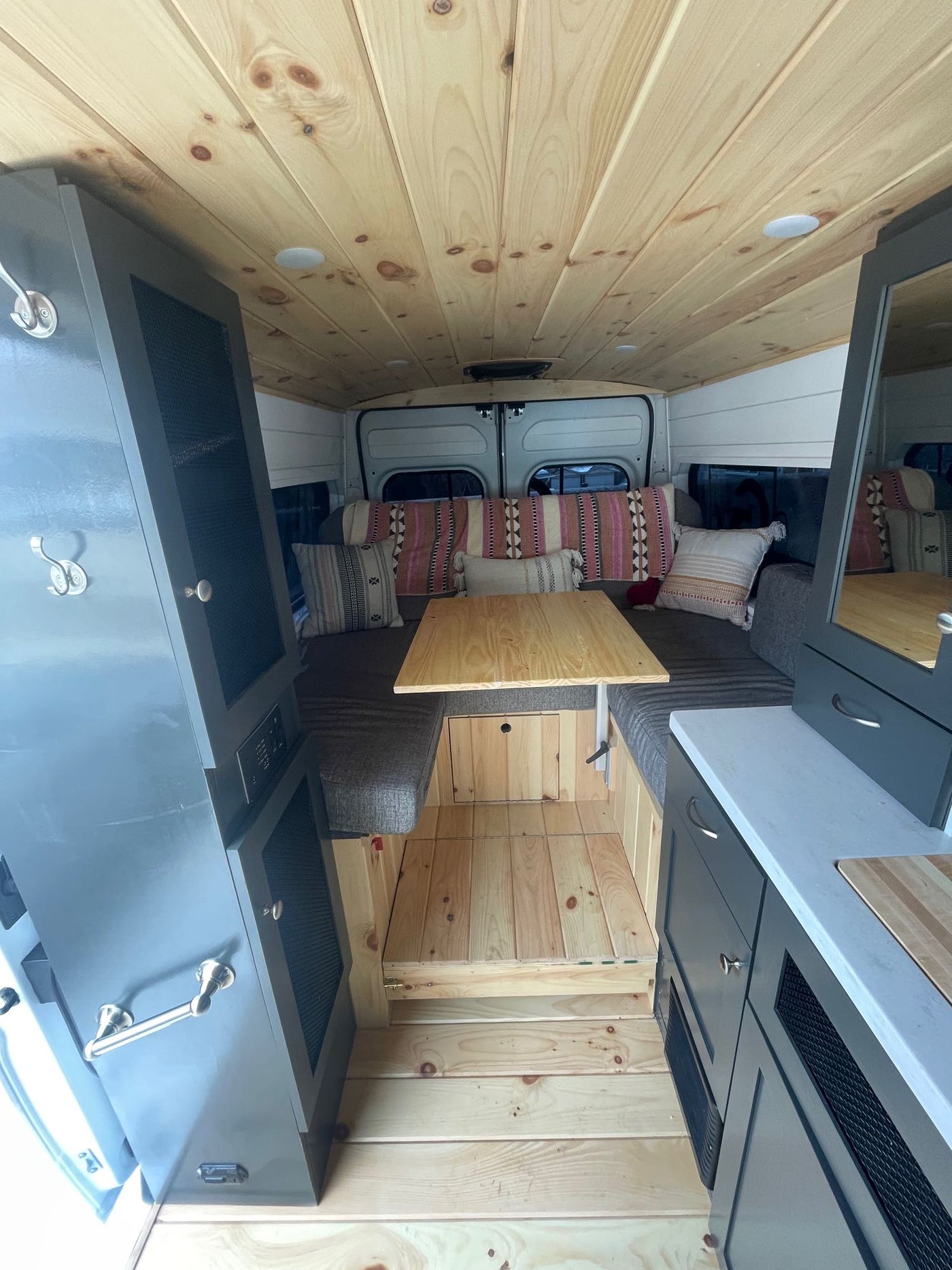  a unique RV rental with topographical map design and off-road tires — photo 2