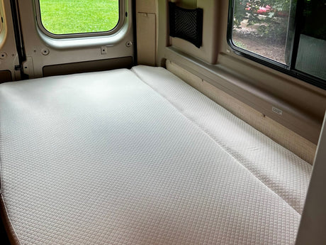  and sink.|Compact RV rental wet bath with a stainless steel sink