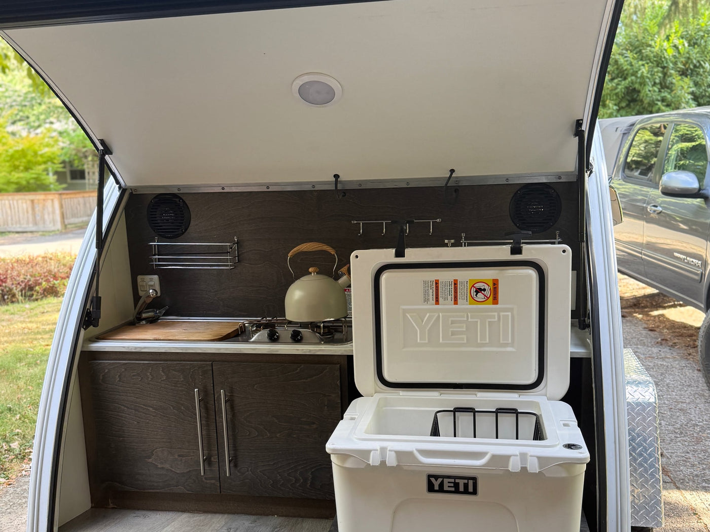  equipped for rugged outdoor camping adventures.|A white Boondock Edge T@G teardrop rv rental travel trailer — photo 4