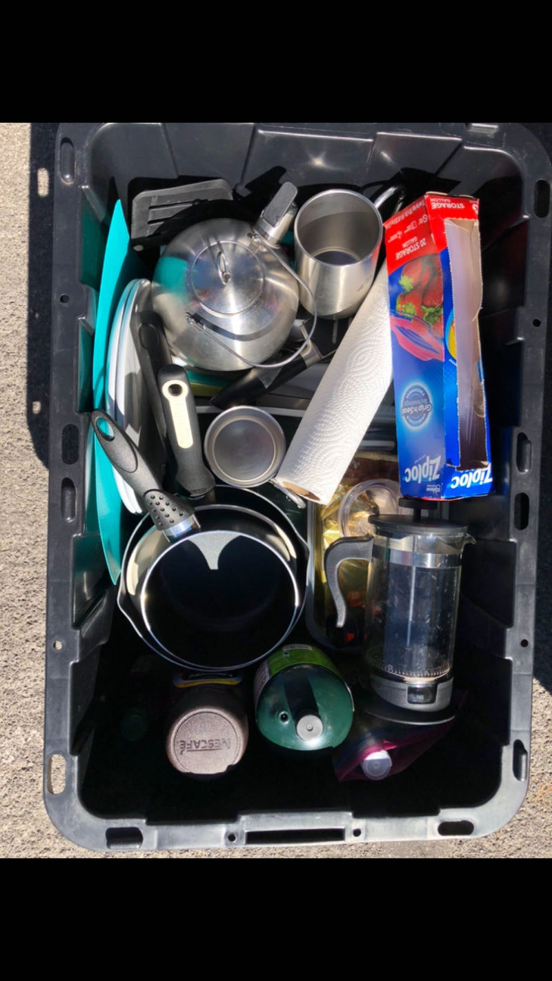  and chair bags neatly stored for your trip.|RV rental kitchen gear packed in a bin: kettle — photo 17