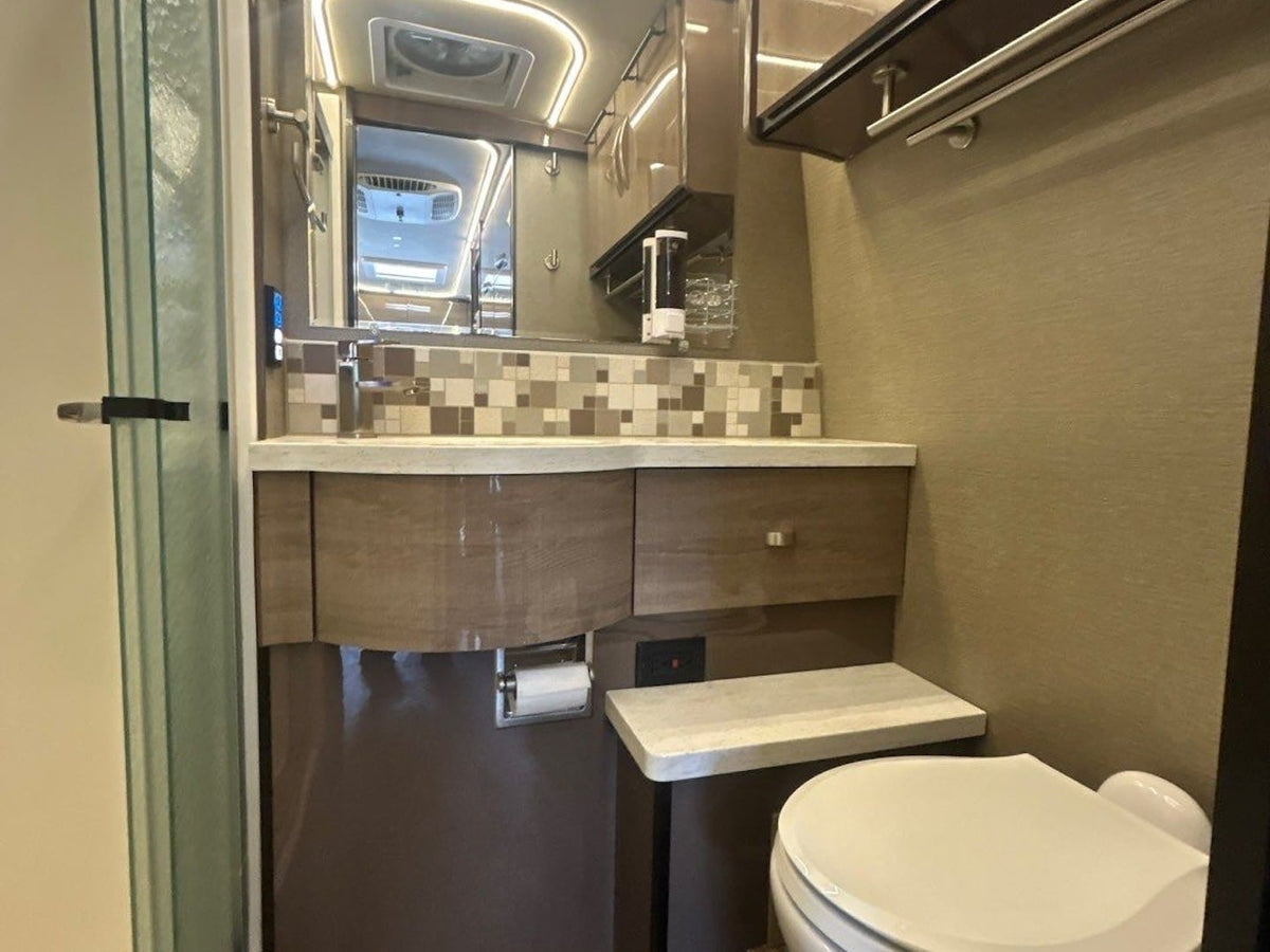 ready for your next adventure.|This silver Mercedes-Benz Sprinter rv rental features a high roof — photo 13