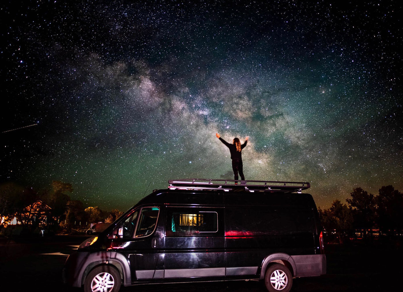  perfect for your next RV rental adventure and exploring the outdoors.|Black Citroën RV rental van with a platform hitch bike rack attached — photo 3