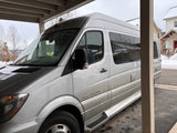 Explore this luxurious silver camper van, perfect as an RV rental for your winter road trip adventures.