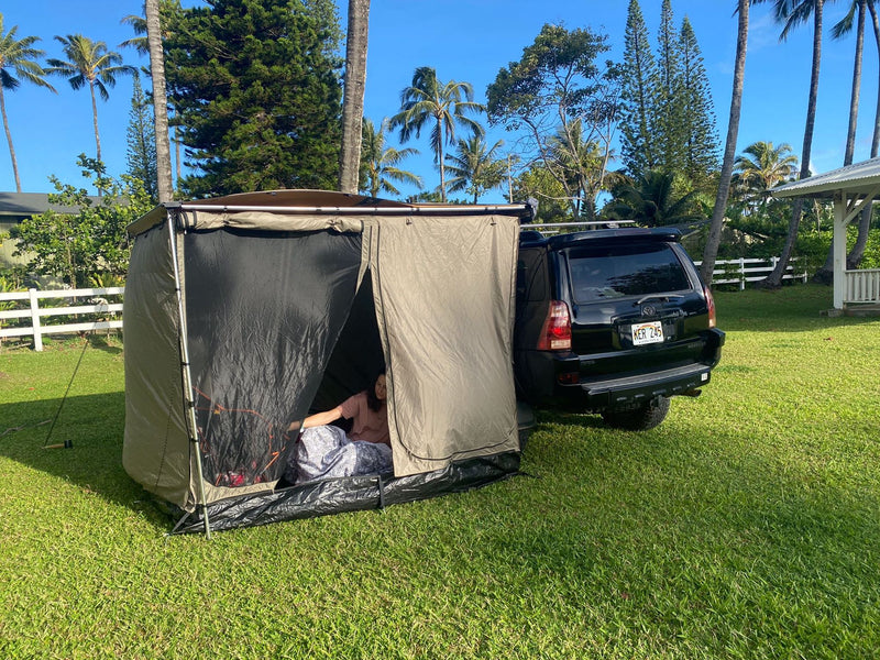  and Coleman stove setup for camping. A unique RV rental alternative for nature trips.|Cozy RV rental sleeping space for camping — photo 3