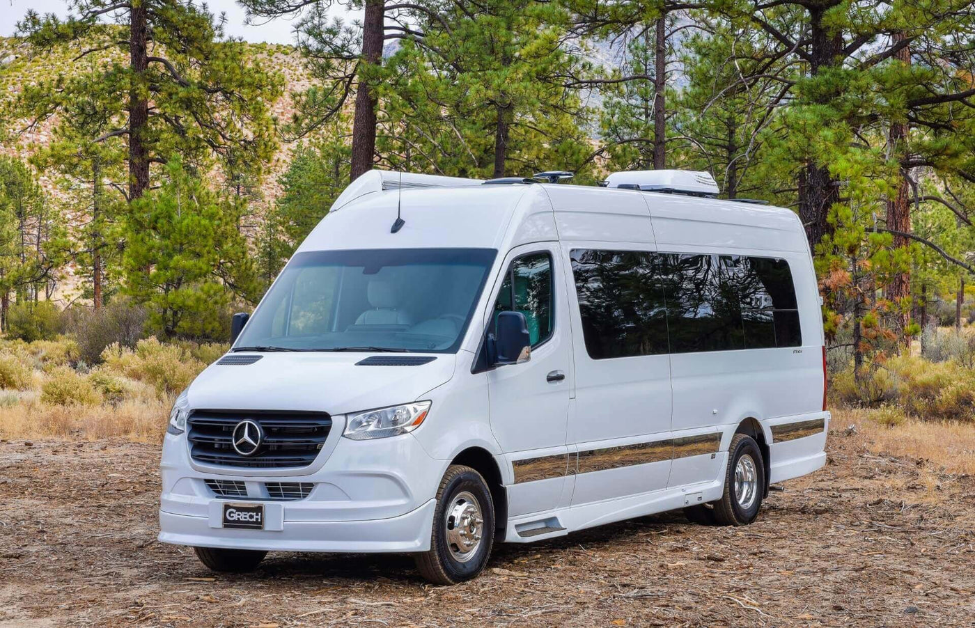  and ambient lighting for comfortable travel.|Spacious RV rental interior with cream leather seating — photo 7