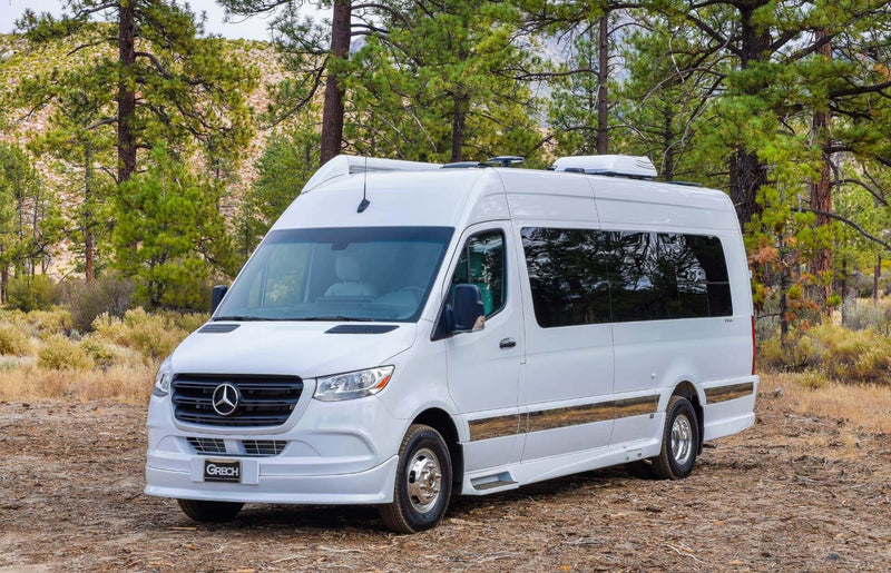  and ambient lighting for comfortable travel.|Spacious RV rental interior with cream leather seating — photo 7