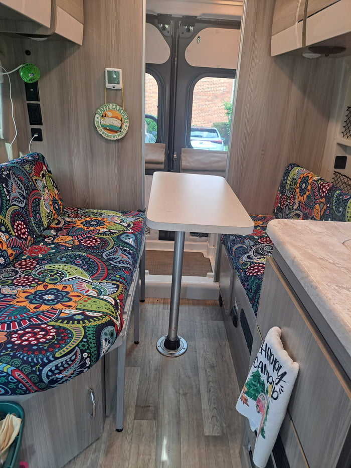  and fridge for trips.|An rv rental's interior