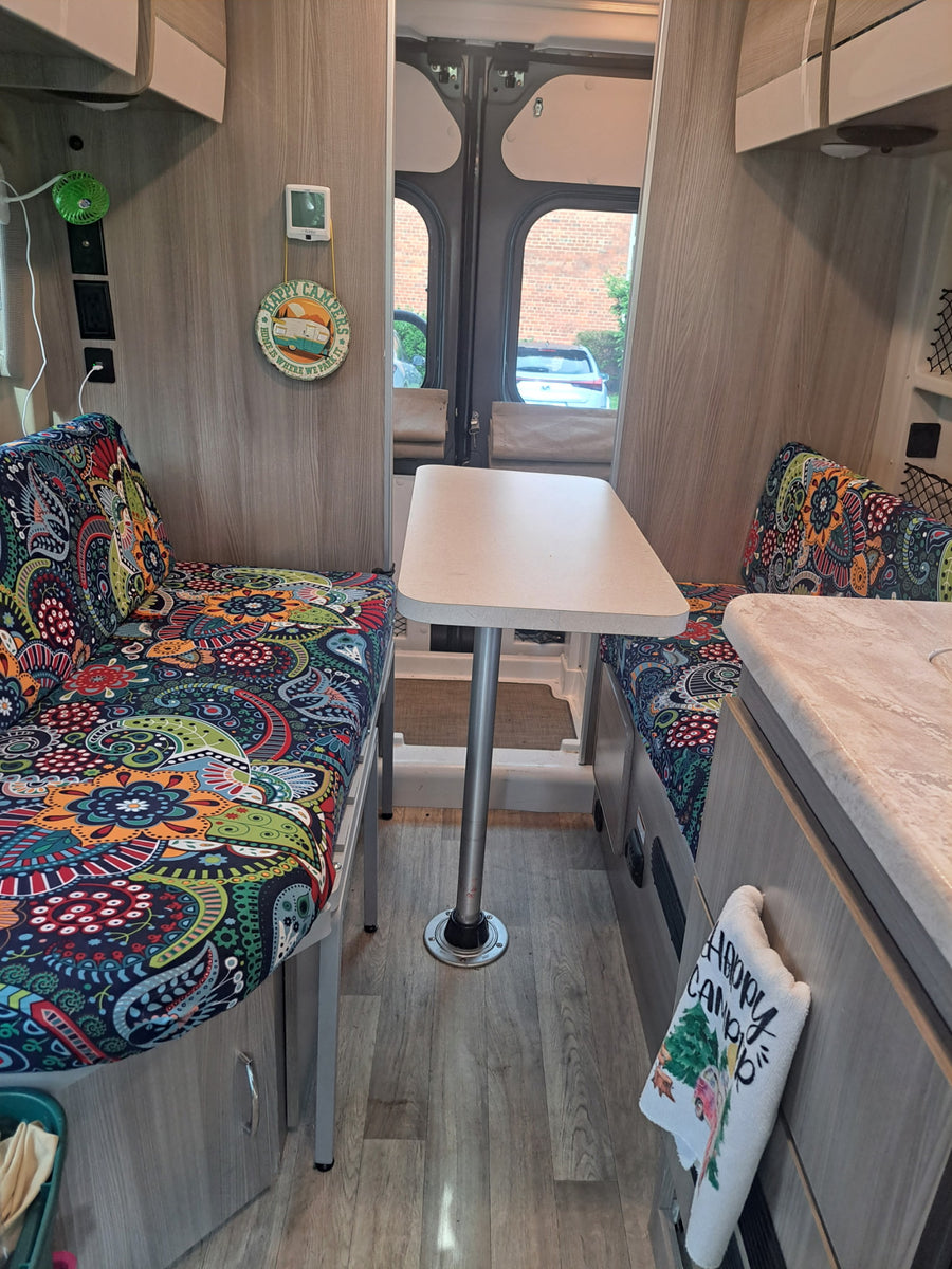  and fridge for trips.|An rv rental's interior