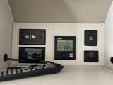 An RV rental's utility panel: Winegard TV, Truma control, USB charging, and HDMI ports for entertainment and convenience.