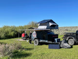 Preparing a BRX teardrop camper trailer with rooftop tent & solar for an RV rental camping trip.