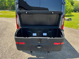Open StowAway cargo box on an RV rental. This hitch-mounted exterior storage unit adds valuable space.