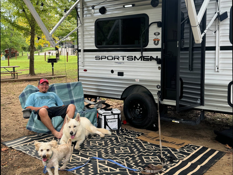  enjoying the outdoors.|White Jeep Gladiator towing a Sportsmen RV rental with bikes — photo 5