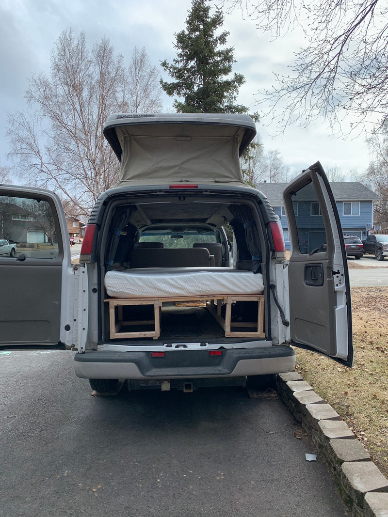 Custom Sportsmobile camper van with pop-top & bed conversion, perfect for an RV rental adventure. — photo 9