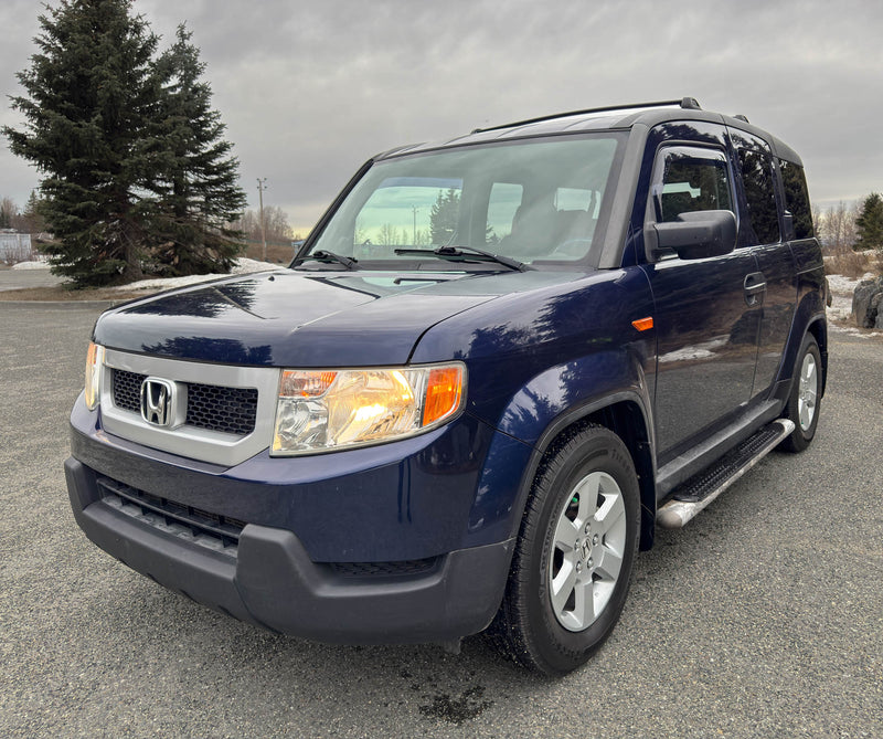 Blue Honda Element — photo 1
