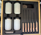 RV rental picnic set: White Purist tumblers, wood-handled knives, and a multi-tool, neatly organized in a custom foam-lined wooden box.