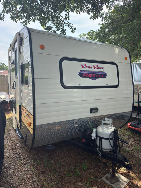 This White Water Retro travel trailer RV rental, with its classic style, is ready for your next adventure.