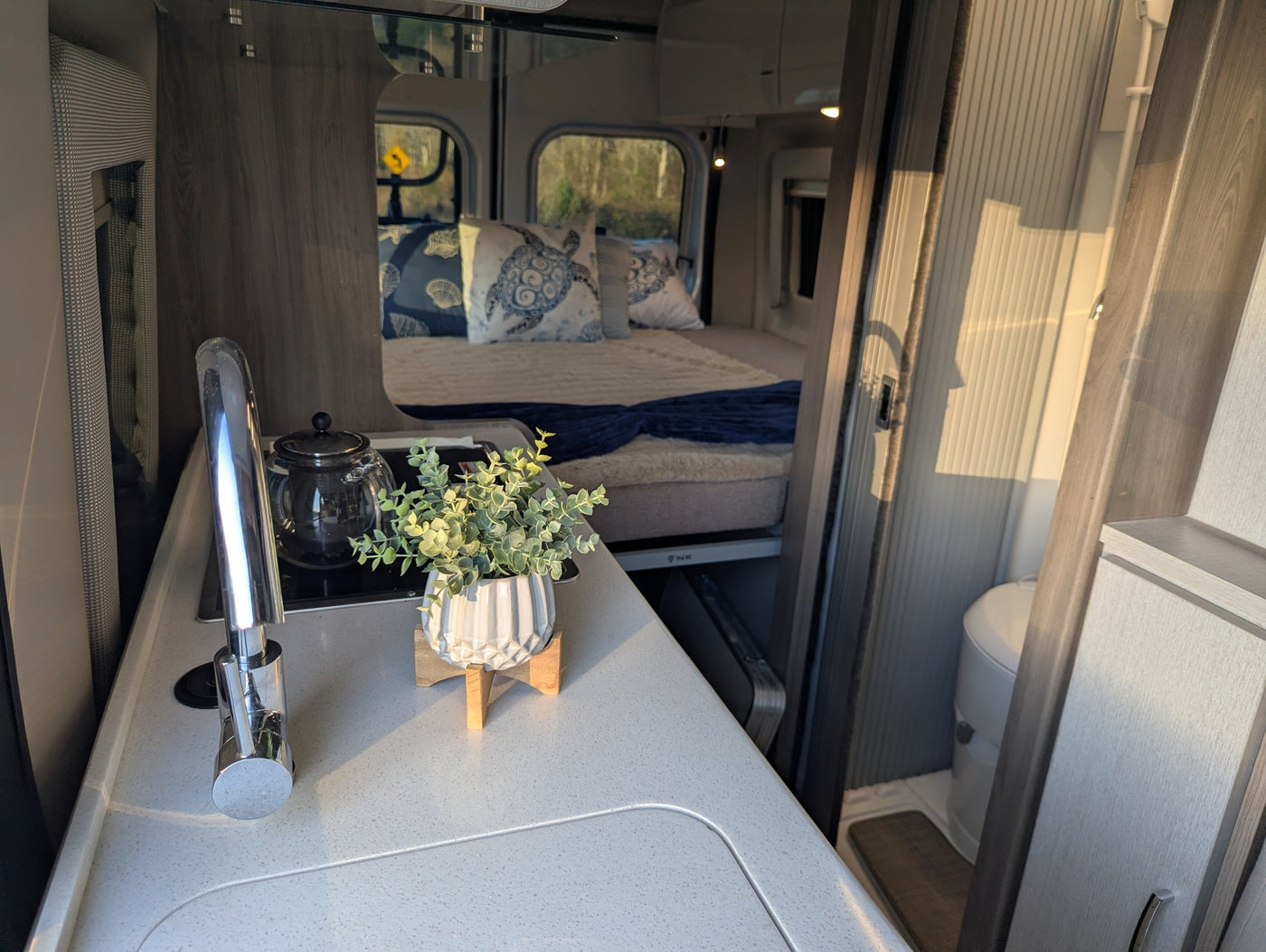  and two back windows to the outdoors.|Inside this RV rental camper van — photo 12