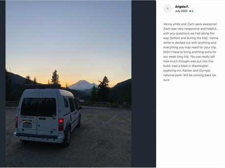 White Ford Transit Connect RV rental at sunset with Mt. Rainier. Perfect for national park exploration.