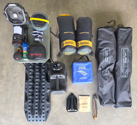 Essential outdoor & overlanding gear for your RV rental adventure: chairs, blankets, lights, first aid, traction boards, and tools.