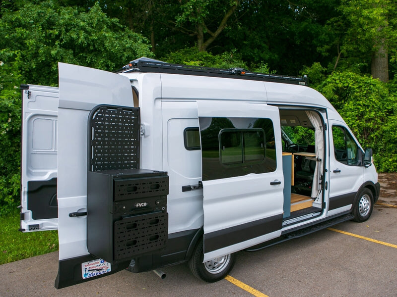  perfect for your next RV rental adventure.|White RV rental camper van in a lush forest. Side door open — photo 2