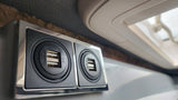 Dual 5V 2x2.5A USB charging ports in an RV rental, providing convenient power for mobile devices.