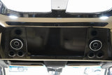 RV rental interior: Overhead TV, JL Audio speakers, and air vents offer premium entertainment & climate control.