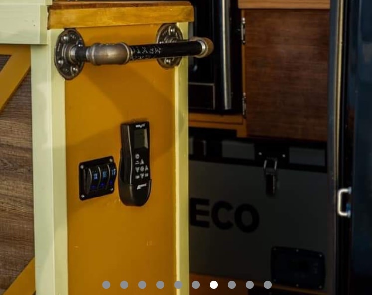  and a guitar for travel tunes.|RV rental interior: Industrial grab bar — photo 5