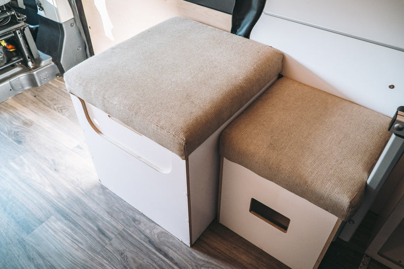  enjoying a scenic view from the camper van bed. Perfect for pet-friendly travel.|This RV rental's comfy camper van interior features a bed — photo 4