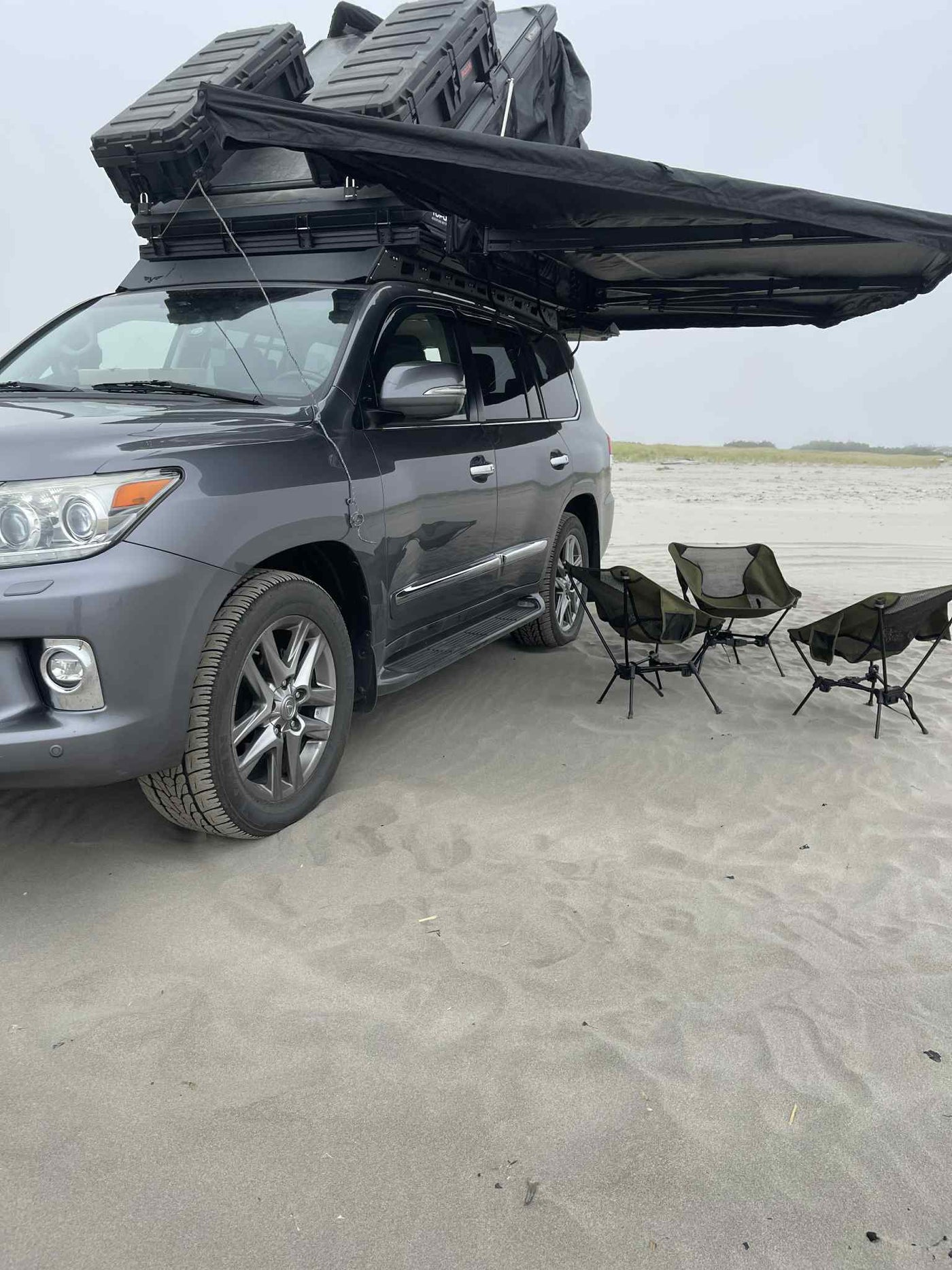 Lexus LX with rooftop tent & awning on a sandy beach. Ideal for overlanding adventures or a unique RV rental. — photo 3