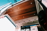 Step inside this cozy RV rental with custom wood ceilings, modern cabinets, and kitchen. Ready for adventure!