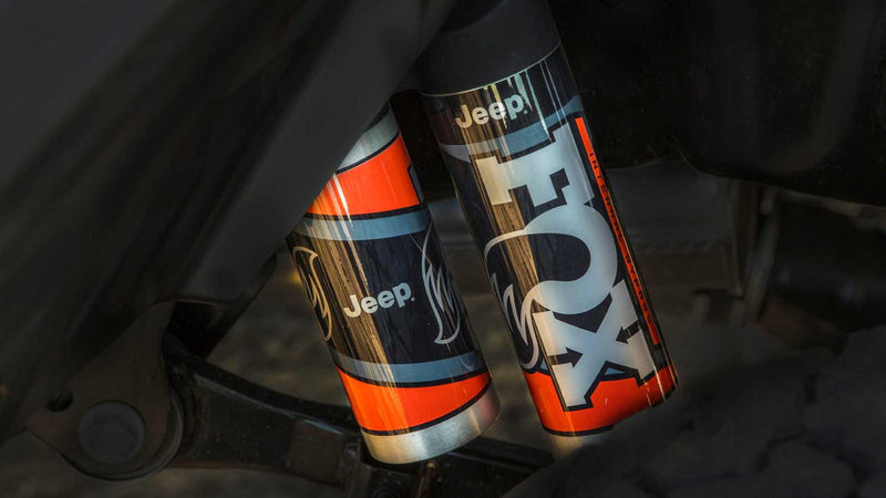  enhancing any rv rental journey.|Detailed view of Jeep-branded FOX off-road shocks — photo 7