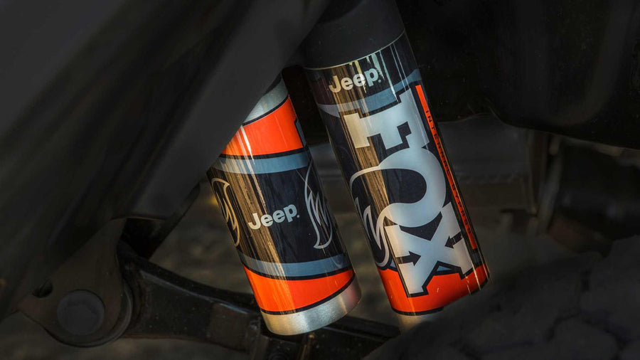  enhancing any rv rental journey.|Detailed view of Jeep-branded FOX off-road shocks