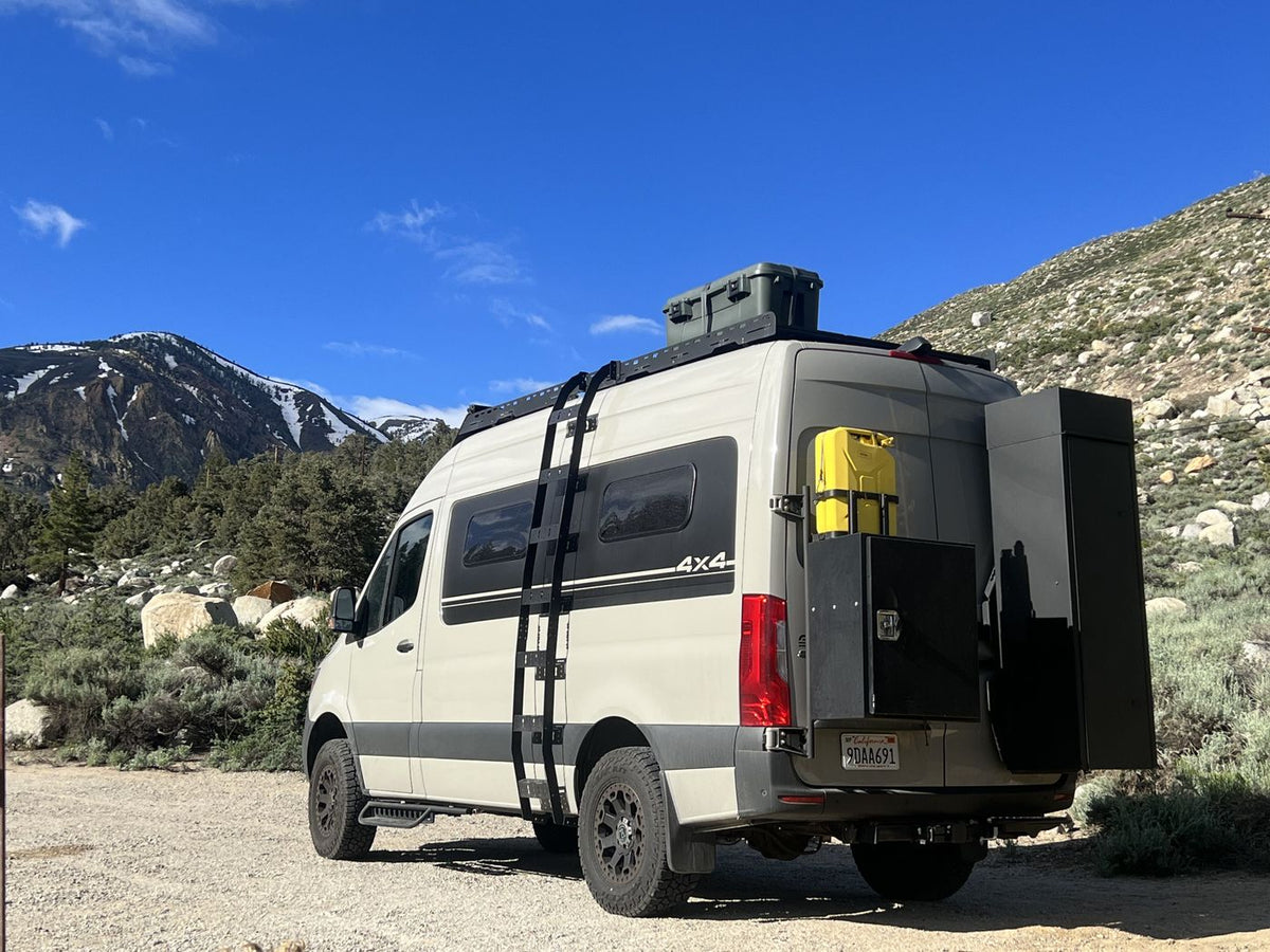  and dinette with city views. Your adventure awaits!|This rv rental offers a functional mobile workspace with a kitchen — photo 8