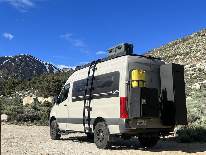  and dinette with city views. Your adventure awaits!|This rv rental offers a functional mobile workspace with a kitchen — photo 8