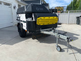 Black & white Patriot Campers off-road camper trailer, ready for rv rental. Great for overlanding adventures!