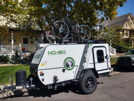 This RV rental, a No Boundaries trailer, is equipped with a mountain bike for your next outdoor adventure.